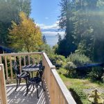 Private oceanfront balcony at Ocean Wilderness Inn, providing an elevated vantage point for whale watching over the Salish Sea.